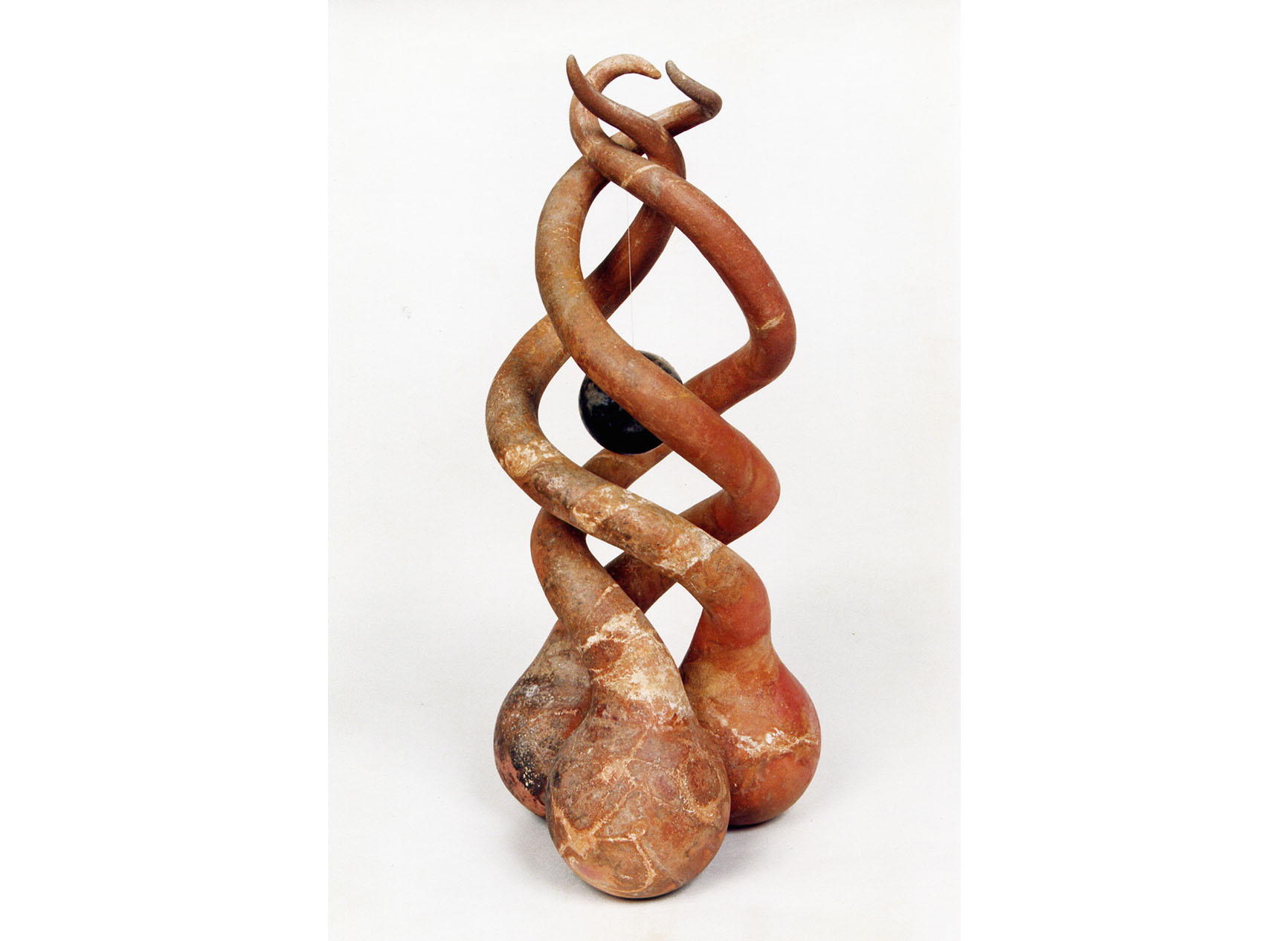 Large twisting natural sculpture, salt fired with various chemicals, called Explorer