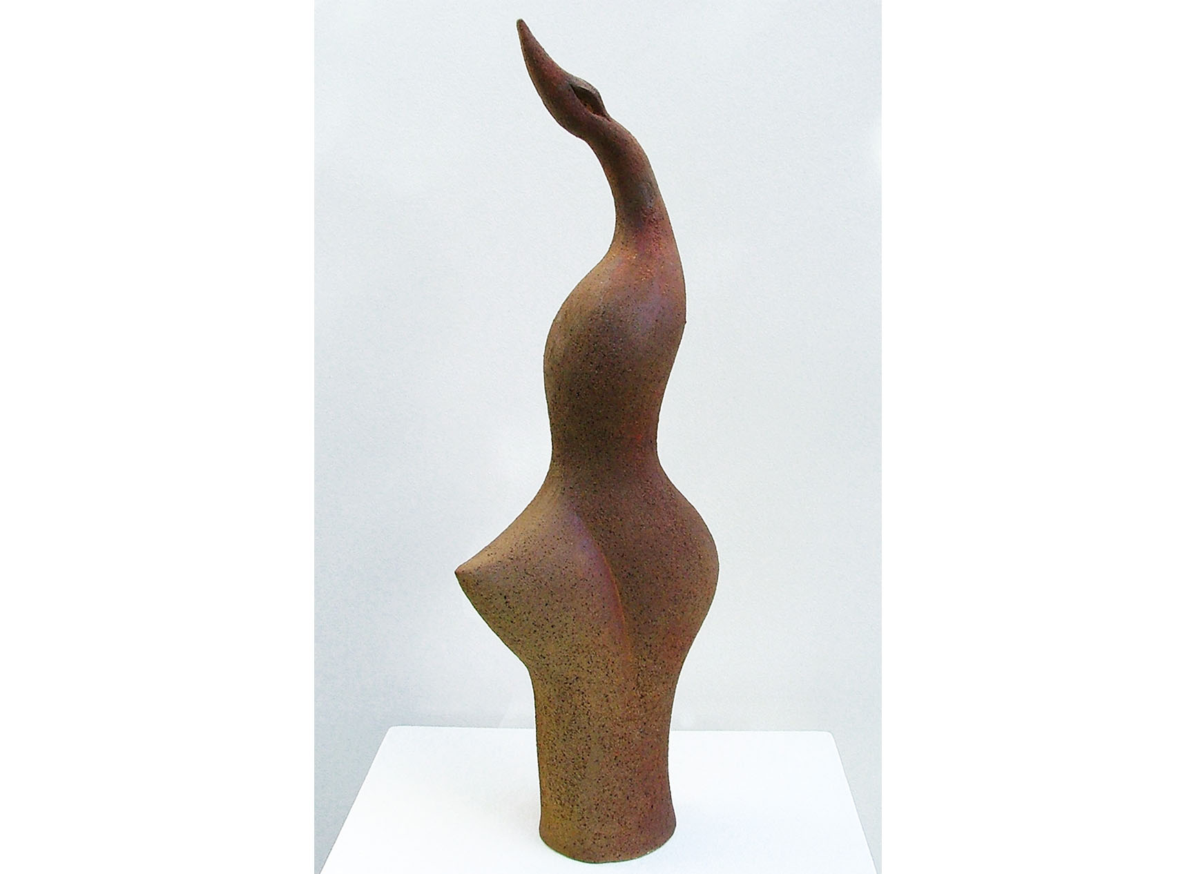 Curvacious clay sculpture with bird head called Tehuti Gender Bender