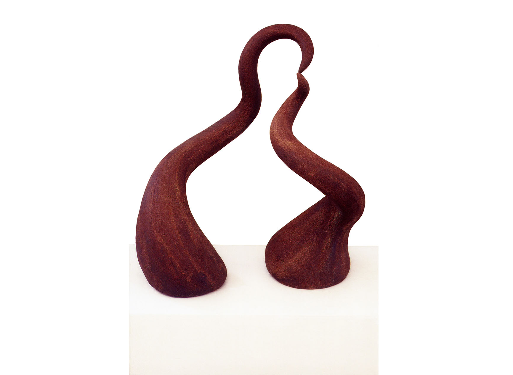 Two twisting clay sculptures, meeting together, called The Meeting